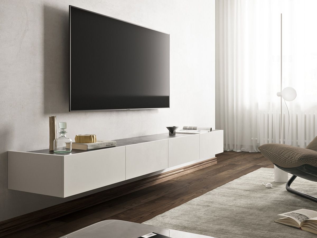 Біла підвісна тумба у вітальні Біла підвісна тумба у вітальні